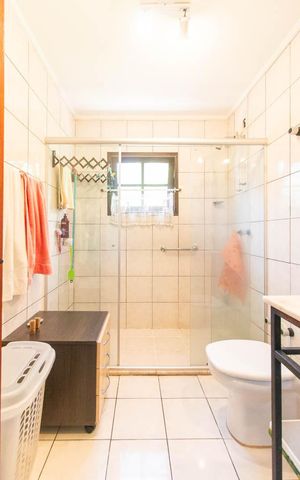 Casa à venda com 390m², 4 quartos e 2 vagasBanheiro da Suíte