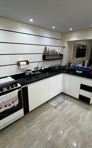 Casa à venda com 148m², 3 quartos e 2 vagas Casa à venda com 148m², 3 quartos e 2 vagasCozinha