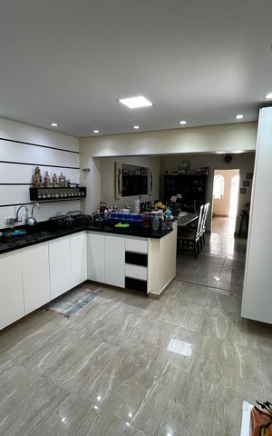 Casa à venda com 148m², 3 quartos e 2 vagas Casa à venda com 148m², 3 quartos e 2 vagasCozinha