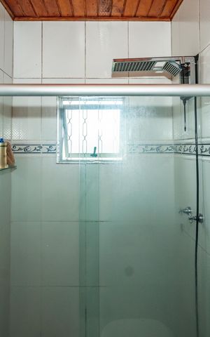Casa à venda com 300m², 4 quartos e sem vagaBanheiro da Suíte 2