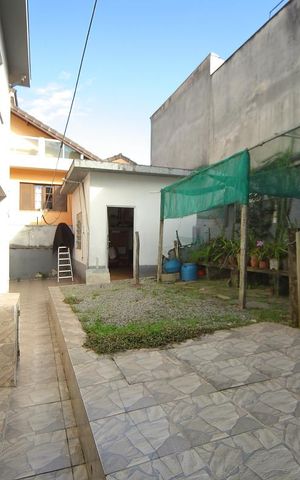 Casa à venda com 265m², 4 quartos e 2 vagasÁrea de serviço/quintal 