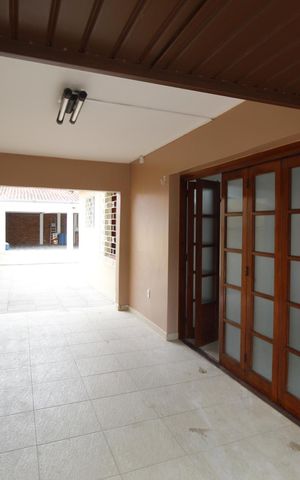 Casa à venda com 262m², 4 quartos e 4 vagasGaragem