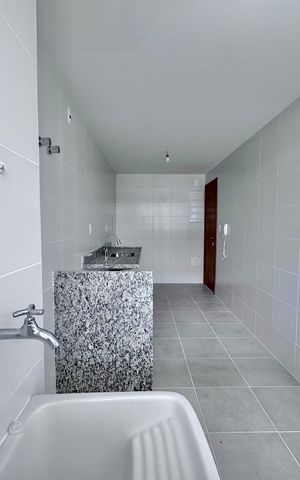 Apartamento à venda com 60m², 2 quartos e 1 vaga Apartamento à venda com 60m², 2 quartos e 1 vagaCozinha e Área de Serviço