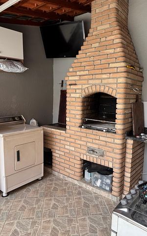 Casa à venda com 202m², 4 quartos e 6 vagasCasa 1 - Quintal - Area de Serviço