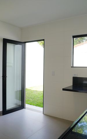 Casa à venda com 130m², 3 quartos e 2 vagas Casa à venda com 130m², 3 quartos e 2 vagasCozinha