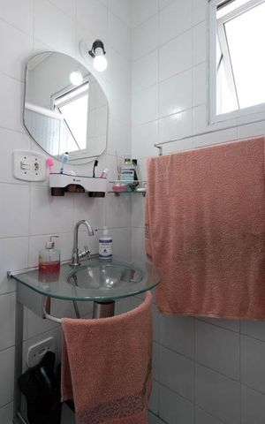 Casa à venda com 84m², 3 quartos e 2 vagasBanheiro da Suíte 1
