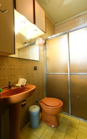 Casa à venda com 155m², 3 quartos e 2 vagas Casa à venda com 155m², 3 quartos e 2 vagasBanheiro da Suíte 1