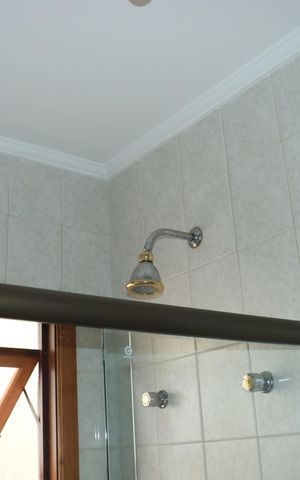 Casa de condomínio para alugar com 360m², 5 quartos e 6 vagasBanheiro da Suíte 3