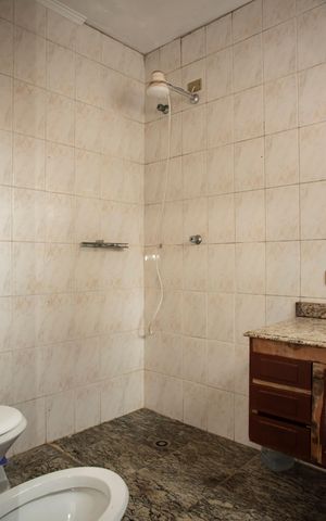 Casa à venda com 200m², 3 quartos e 3 vagasBanheiro da Suíte 2