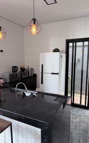 Casa à venda com 118m², 3 quartos e 2 vagas Casa à venda com 118m², 3 quartos e 2 vagasCozinha