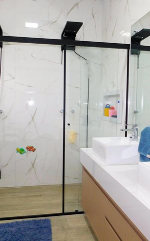 Casa de condomínio para alugar com 250m², 3 quartos e 4 vagasBanheiro da Suíte 2