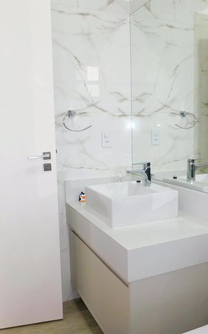Casa de condomínio para alugar com 250m², 3 quartos e 4 vagasBanheiro da Suíte 2