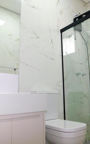 Casa de condomínio para alugar com 250m², 3 quartos e 4 vagasBanheiro da Suíte 2