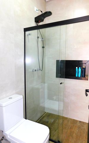 Casa de condomínio para alugar com 250m², 3 quartos e 4 vagasBanheiro da Suíte 1