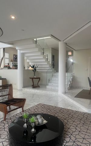 Casa de condomínio à venda com 980m², 5 quartos e 6 vagasSala de estar
