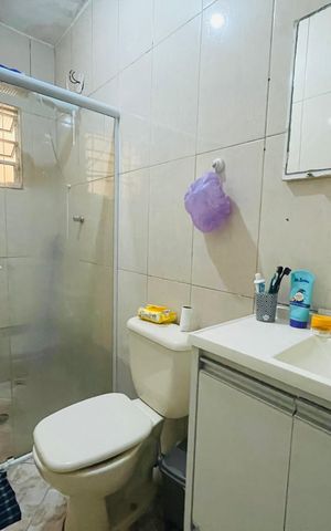 Casa à venda com 80m², 2 quartos e 1 vaga Casa à venda com 80m², 2 quartos e 1 vagaBanheiro 1