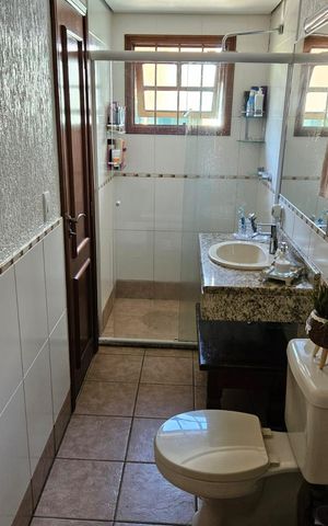 Casa à venda com 224m², 4 quartos e 3 vagas Casa à venda com 224m², 4 quartos e 3 vagasBanheiro Social 1