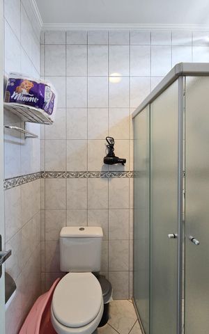 Casa de condomínio à venda com 102m², 3 quartos e 2 vagasBanheiro da Suíte