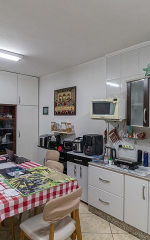 Casa à venda com 170m², 3 quartos e 3 vagas Casa à venda com 170m², 3 quartos e 3 vagasCozinha