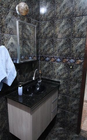 Casa à venda com 273m², 4 quartos e 4 vagasBanheiro Social