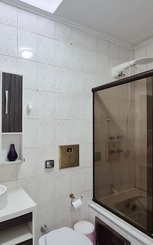 Casa à venda com 450m², 4 quartos e 2 vagasBanheiro da Suíte 2