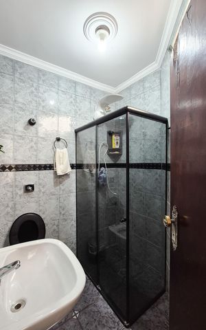 Casa à venda com 450m², 4 quartos e 2 vagasBanheiro da Suíte 3