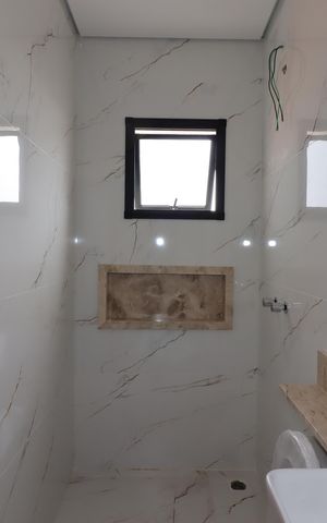 Casa à venda com 200m², 4 quartos e 4 vagasBanheiro da Suíte 1