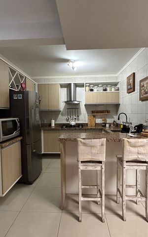 Casa à venda com 150m², 4 quartos e 2 vagas Casa à venda com 150m², 4 quartos e 2 vagasCozinha