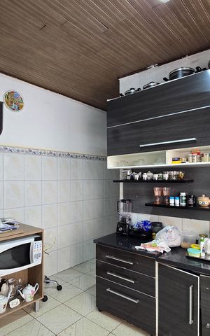 Casa à venda com 153m², 2 quartos e 2 vagas Casa à venda com 153m², 2 quartos e 2 vagasCozinha