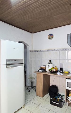 Casa à venda com 153m², 2 quartos e 2 vagas Casa à venda com 153m², 2 quartos e 2 vagasCozinha