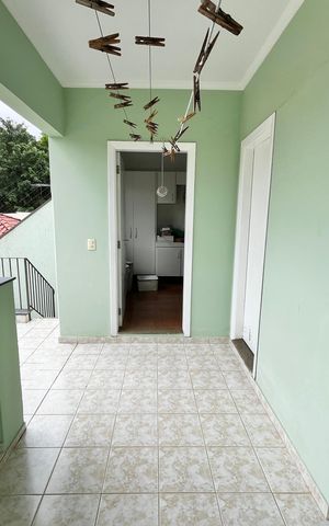 Casa à venda com 317m², 4 quartos e 4 vagas Casa à venda com 317m², 4 quartos e 4 vagasLavanderia