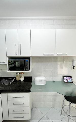 Casa à venda com 317m², 4 quartos e 4 vagas Casa à venda com 317m², 4 quartos e 4 vagasCozinha