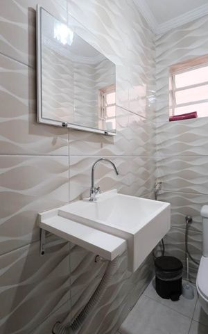 Casa à venda com 200m², 4 quartos e 2 vagasLavabo