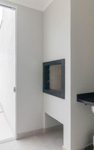 Casa de condomínio à venda com 96m², 3 quartos e 2 vagasCozinha e Área de Serviço