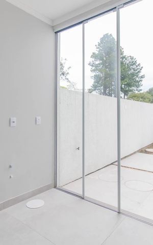 Casa de condomínio à venda com 96m², 3 quartos e 2 vagasCozinha e Área de Serviço