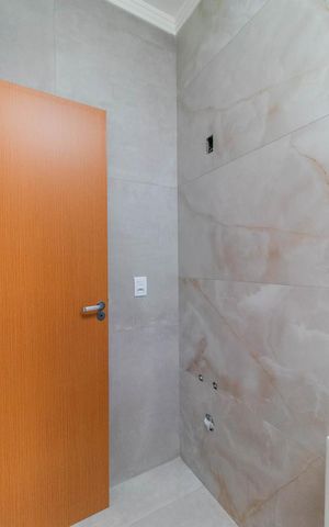 Casa de condomínio à venda com 96m², 3 quartos e 2 vagasBanheiro Social