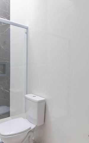 Casa de condomínio à venda com 89m², 3 quartos e 2 vagasBanheiro Social