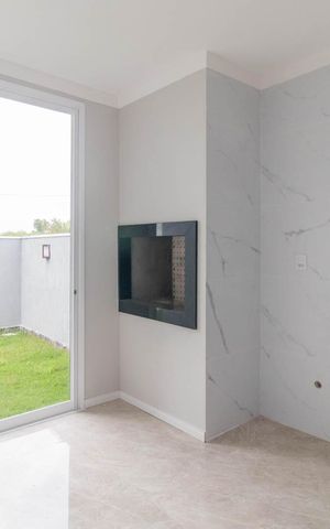 Casa de condomínio à venda com 89m², 3 quartos e 2 vagasCozinha e Área de Serviço