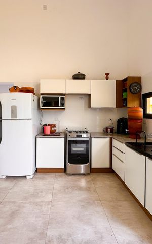 Casa de condomínio para alugar com 186m², 4 quartos e 2 vagasCozinha