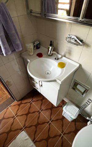 Casa à venda com 110m², 2 quartos e 2 vagas Casa à venda com 110m², 2 quartos e 2 vagasBanheiro de Serviço