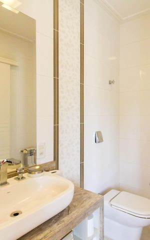 Casa de condomínio à venda com 317m², 4 quartos e 4 vagasBanheiro da Suíte 1