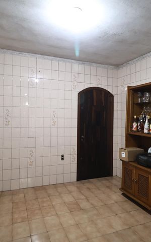 Casa à venda com 180m², 3 quartos e 2 vagas Casa à venda com 180m², 3 quartos e 2 vagasCozinha