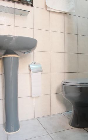 Casa à venda com 252m², 4 quartos e 4 vagasBanheiro de serviço