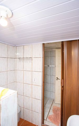 Casa à venda com 250m², 4 quartos e 3 vagasBanheiro da Suíte