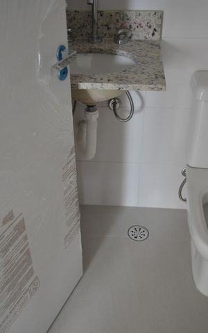 Apartamento à venda com 55m², 2 quartos e 2 vagasBanheiro Social