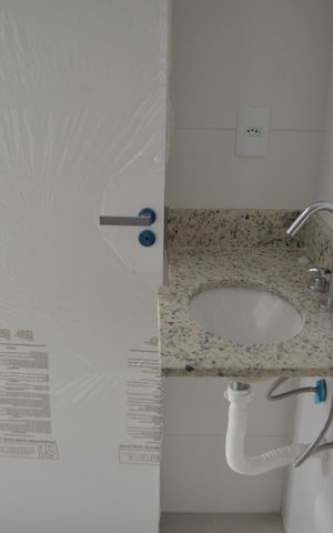 Apartamento à venda com 55m², 2 quartos e 2 vagasBanheiro Social