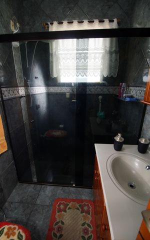 Casa à venda com 400m², 4 quartos e 1 vagaBanheiro
