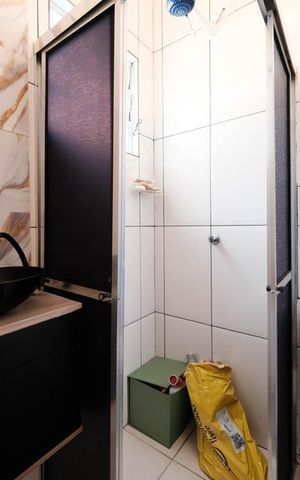 Casa de condomínio à venda com 58m², 2 quartos e 1 vagaSuíte 1