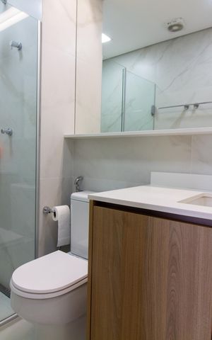 Apartamento à venda com 70m², 1 quarto e 2 vagas Apartamento à venda com 70m², 1 quarto e 2 vagasBanheiro da Suíte
