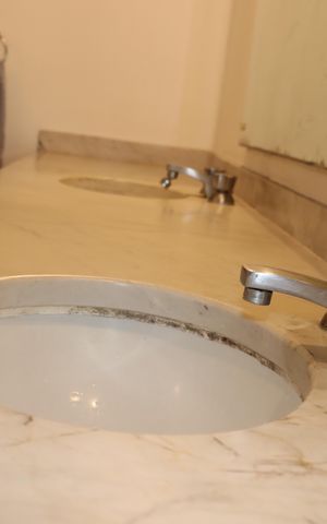 Casa de condomínio para alugar com 750m², 5 quartos e 6 vagasBanheiro da Suíte 3